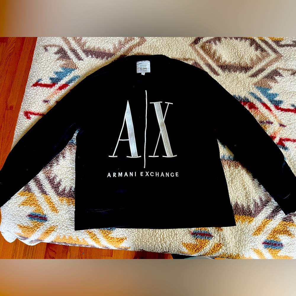 Armani exchange pull over sweater woman’s size large.